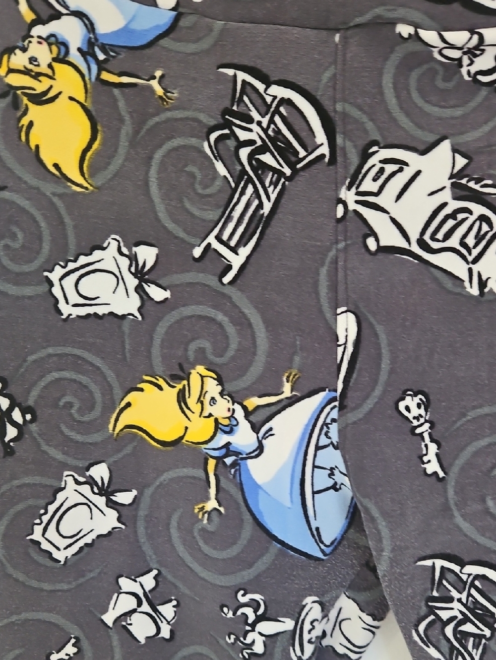Alice In Wonderland original LulaRoe leggings.
